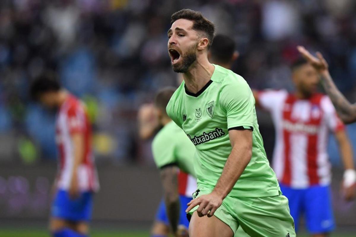 Athletic Bilbao's Spanish defender Yeray Alvarez celebrates with teammates after scoring during the Spanish Super Cup semi-final football match between Athletic Bilbao and Atletico Madrid on January 13, 2022, at the King Fahd International stadium in the Saudi capital of Riyadh. AFP