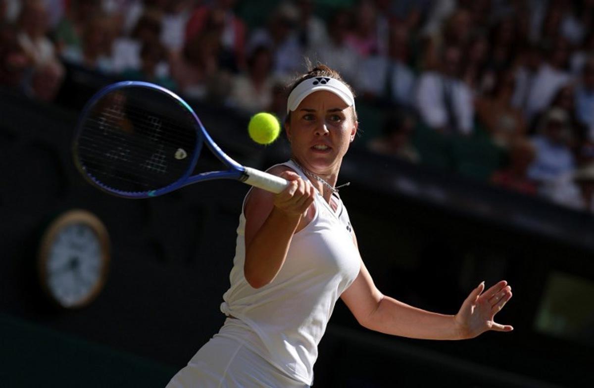 Czech Republic's Linda Noskova returns to Czech Republic's Karolina Muchova during their women's singles final tennis match on the thirteenth day of the 2026 Wimbledon Championships at The All England Lawn Tennis and Croquet Club in Wimbledon, southwest London, on July 11, 2026. Adrian Dennis / AFP