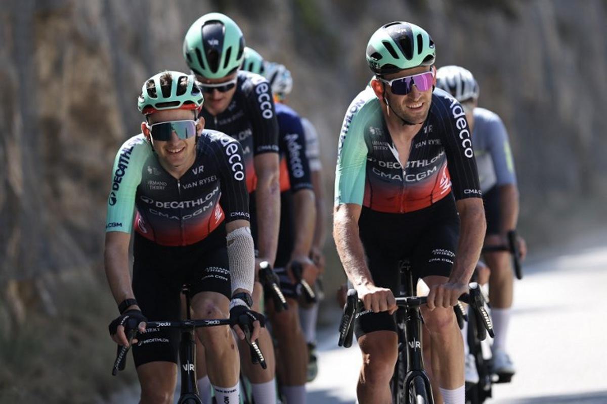 Decathlon CMA CGM Team's French rider Paul Seixas (L) and Decathlon CMA CGM Team's Belgian rider Tiesj Benoot (R) cycle during a team training session on the eve of the start of the 113th edition of the Tour de France cycling race, in Barcelona in northeastern Spain, on July 3, 2026. Anne-Christine POUJOULAT / AFP