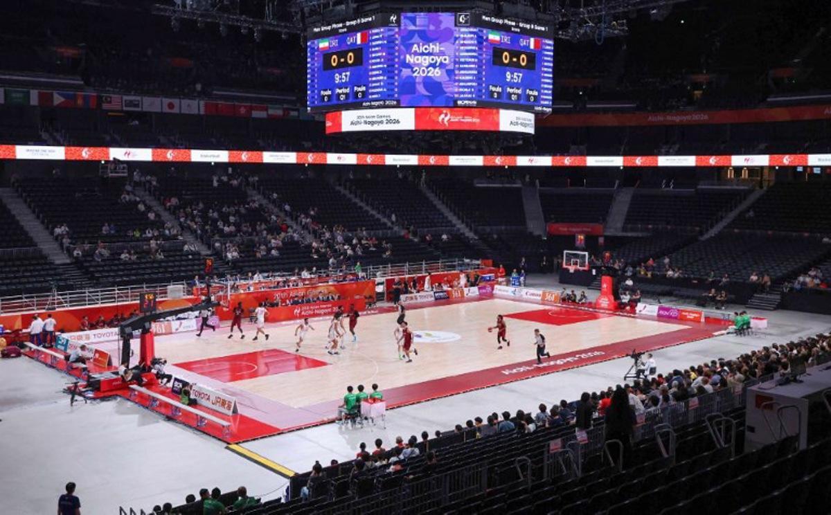 This general view shows players competing in the men's basketball Group B game between Iran and Qatar during the 2026 Asian Games in Nagoya on September 10, 2026. STR / JIJI PRESS / AFP