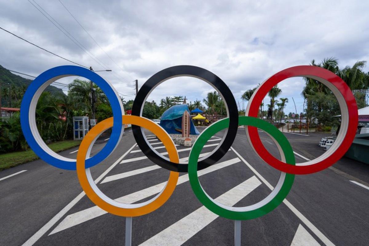 This photograph shows the Olympics rings on the "End of the road" to Teahupo'o on the island of Tahiti, French Polynesia on July 20, 2024, ahead of the opening ceremony of the Paris 2024 Olympic and Paralympic Games. Jerome Brouillet / AFP