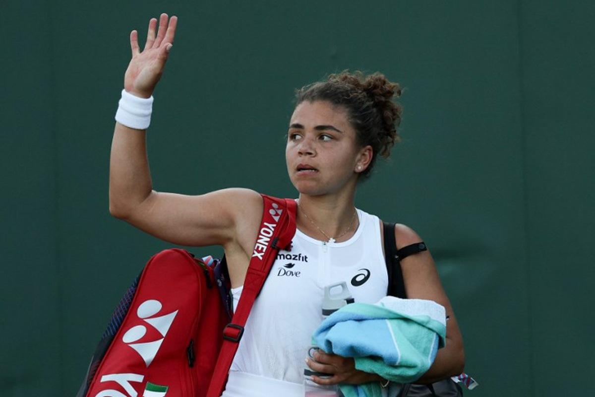 Italy's Jasmine Paolini leaves the court after losing against Russia's Kamilla Rakhimova at the end of their women's singles second round tennis match on the third day of the 2025 Wimbledon Championships at The All England Lawn Tennis and Croquet Club in Wimbledon, southwest London, on July 2, 2025. Adrian Dennis / AFP