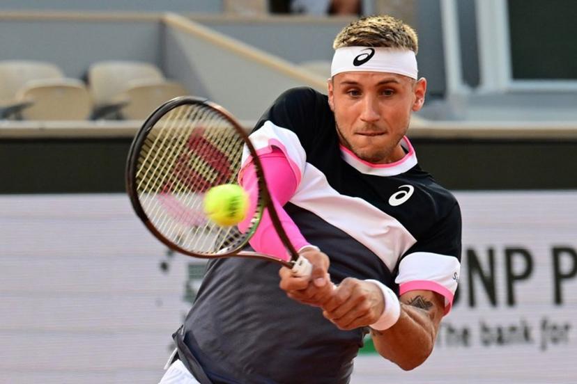 Slovakia's Alex Molcan plays a backhand return to Germany's Alexander Zverev during their men's singles match on day five of the Roland-Garros Open tennis tournament at the Court Philippe-Chatrier in Paris on June 1, 2023. Emmanuel DUNAND / AFP