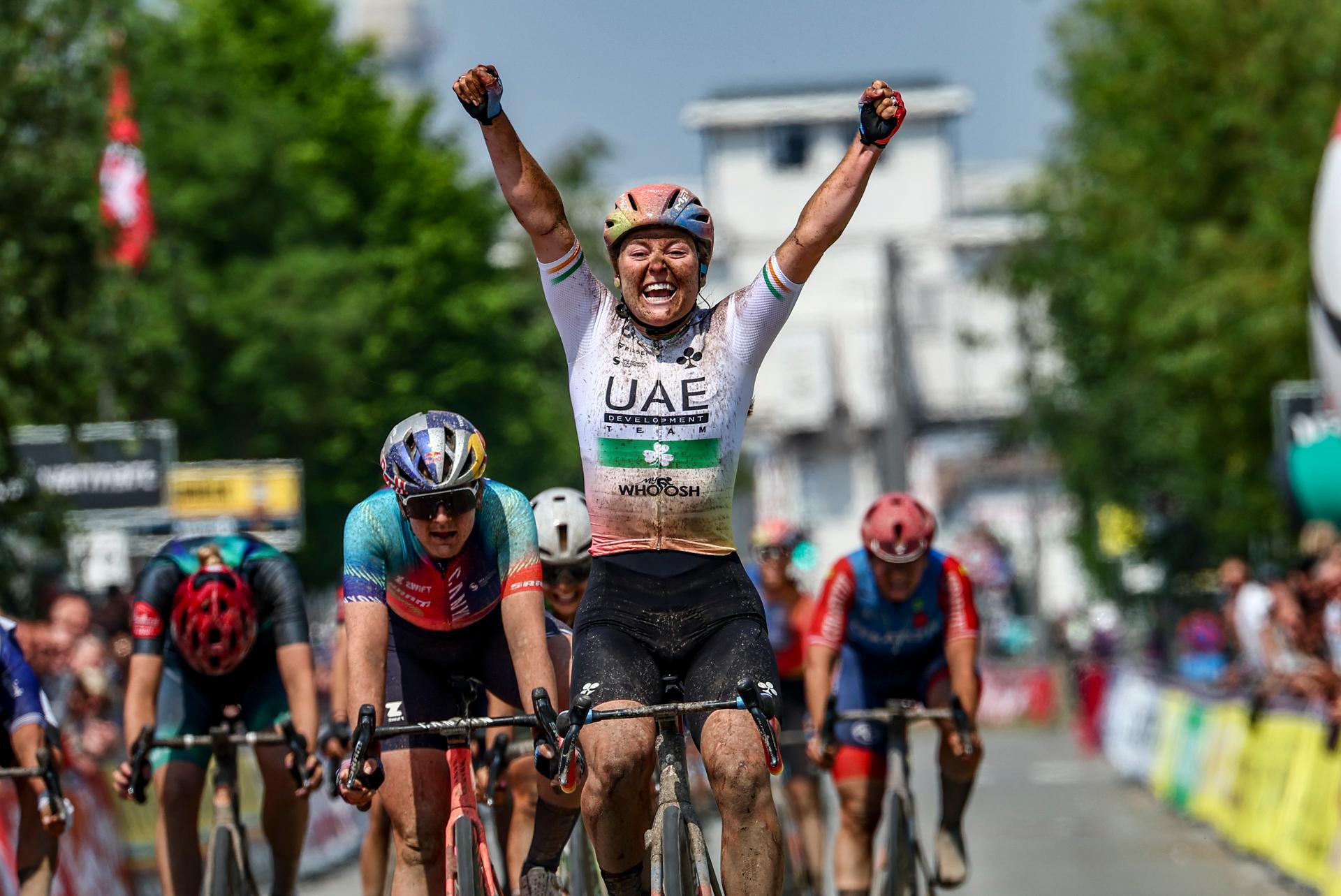 Irish Lara Gillespie of UAE Development team celebrates as she crosses the finish line at the 'Antwerp Port Epic' 'Schaal Sels' women's elite one day cycling race, 140,1 km in and around Antwerp, fifth race (5/10) in the Lotto Cycling Cup, Sunday 19 May 2024. BELGA PHOTO DAVID PINTENS