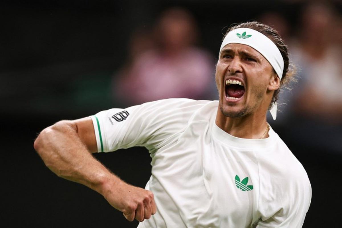 Germany's Alexander Zverev celebrates after winning the second set against France's Arthur Rinderknech during their men's singles first round tennis match on the first day of the 2025 Wimbledon Championships at The All England Lawn Tennis and Croquet Club in Wimbledon, southwest London, on June 30, 2025. HENRY NICHOLLS / AFP