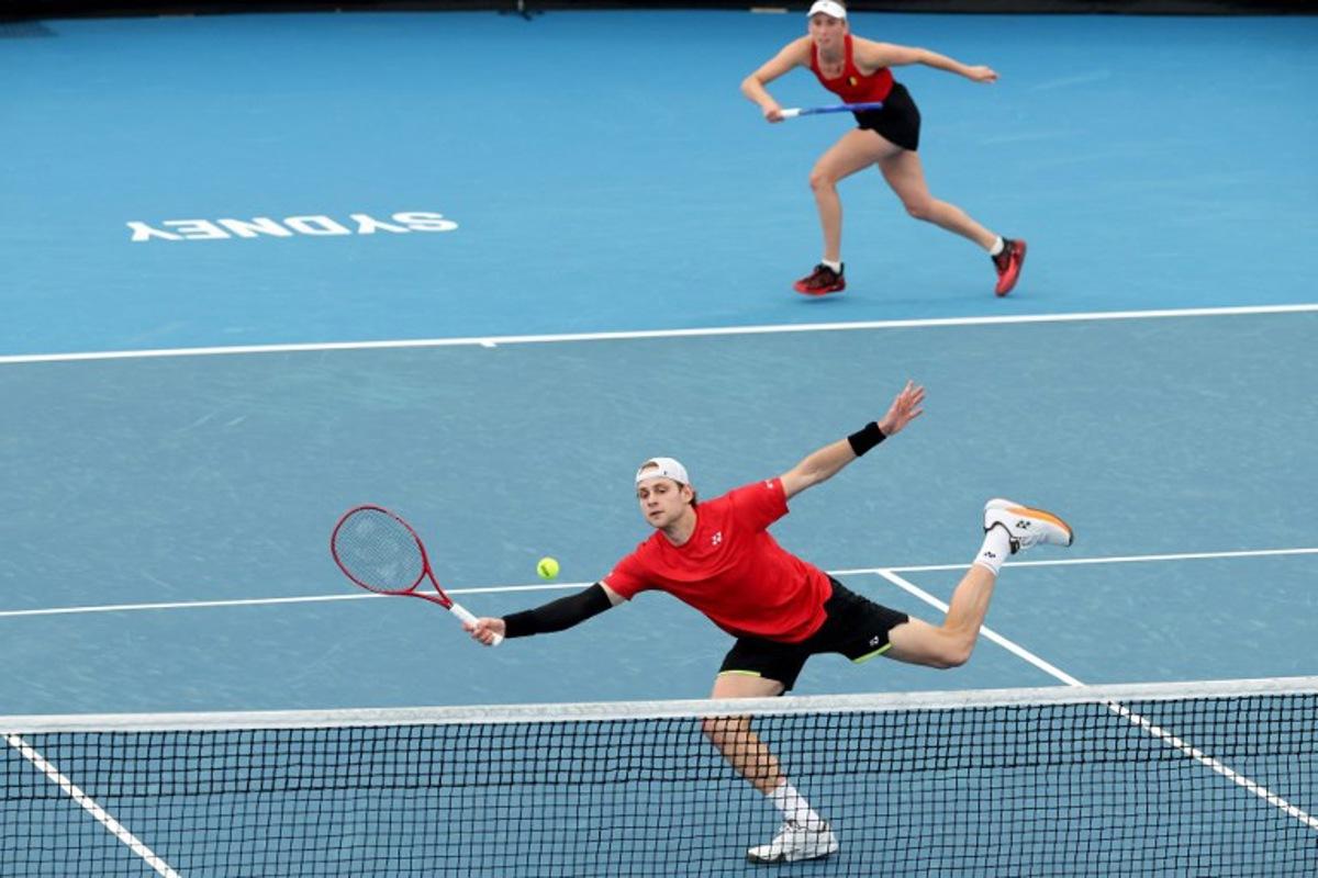 Belgium's Zizou Bergs (L) and Elise Mertens hit a return to China's Zhang Zhizhen and Zhu Lin during their mixed doubles match at the United Cup tennis tournament on Ken Rosewall Arena in Sydney on January 3, 2026. DAVID GRAY / AFP