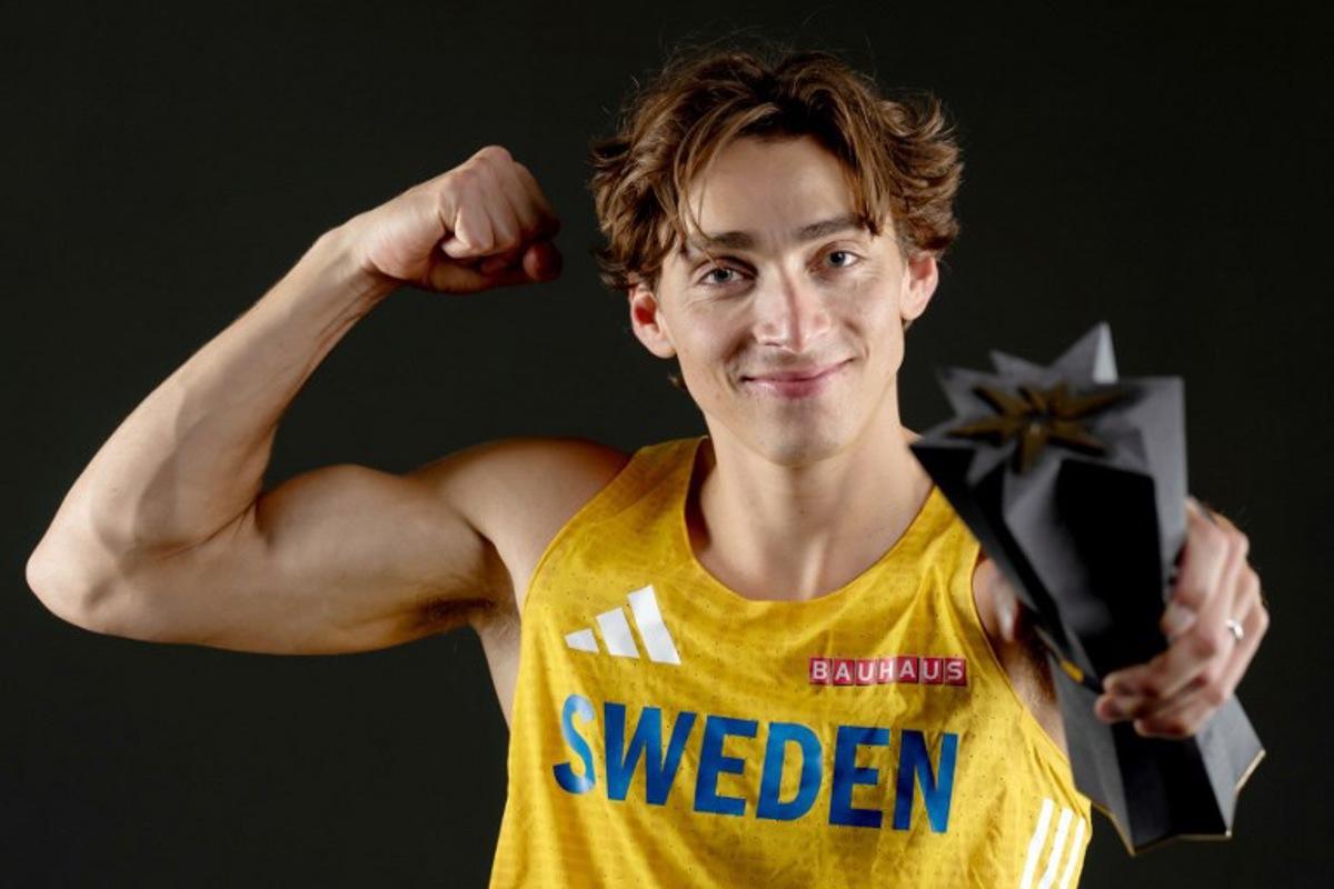 Sweden's Armand Duplantis, winner of the pole vault men competition, poses with his trophy for a photo during a studio photo session on the sidelines of the World Athletics Ultimate Championship at the Gyula Zsivotzky National Athletics Centre in Budapest on September 11, 2026. Andrej ISAKOVIC / AFP