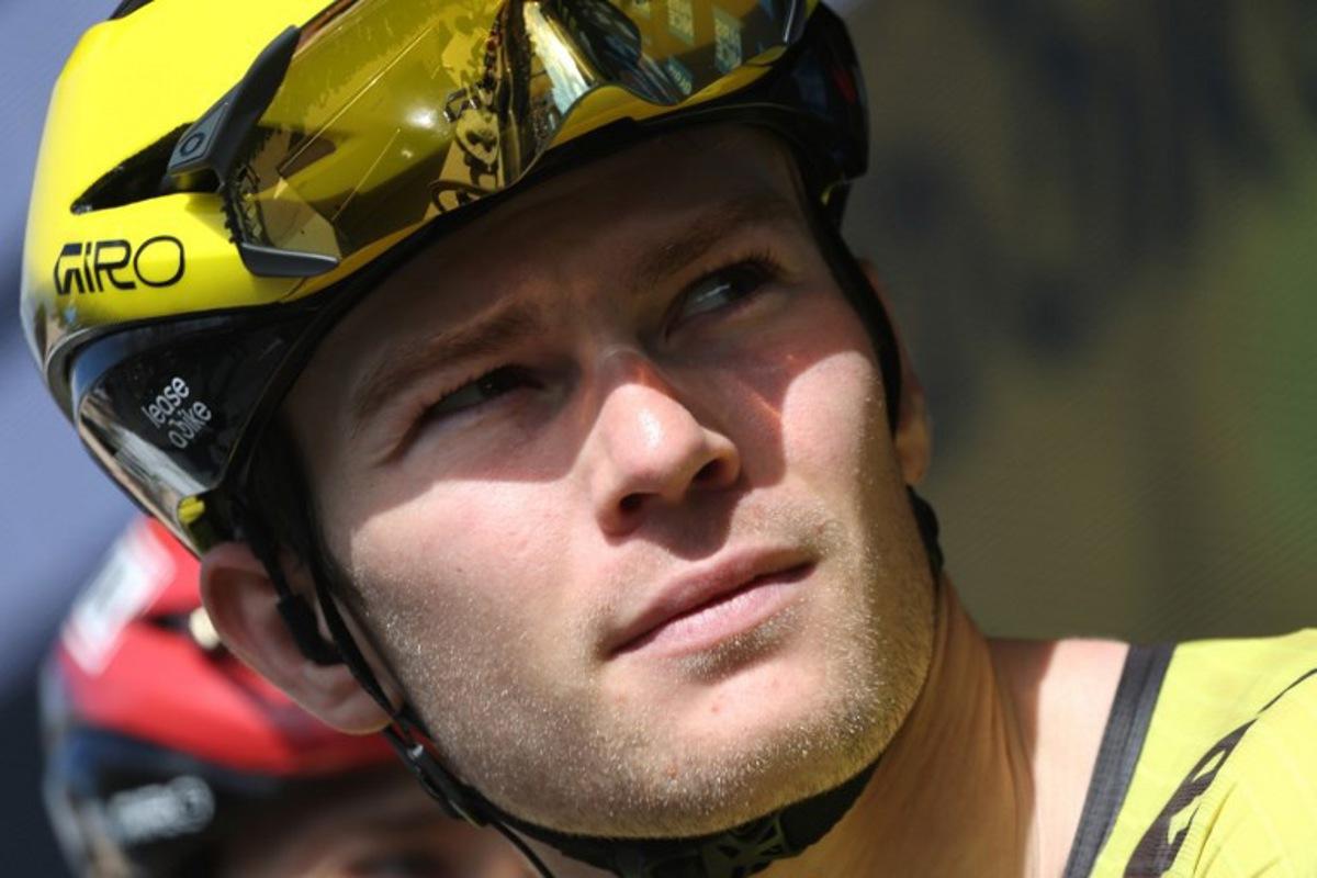 Team Visma - Lease a Bike's French rider Axel Zingle waits for the start of the 5th stage of the Paris-Nice cycling race, 206.3 km between Cormoranche-sur-Saône and Colombier-le-Vieux, on March 12, 2026. Anne-Christine POUJOULAT / AFP