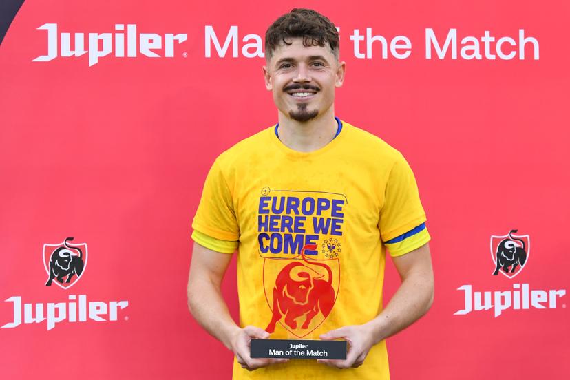 STVV's Arbnor Muja receives the Jupiler Man of the Match award at a soccer match between Sint-Truiden VV and KV Mechelen, Sunday 24 May 2026 in Sint-Truiden, on the last day of the Champion's Play-offs of the 2025-2026 'Jupiler Pro League' first division of the Belgian championship. BELGA PHOTO JILL DELSAUX