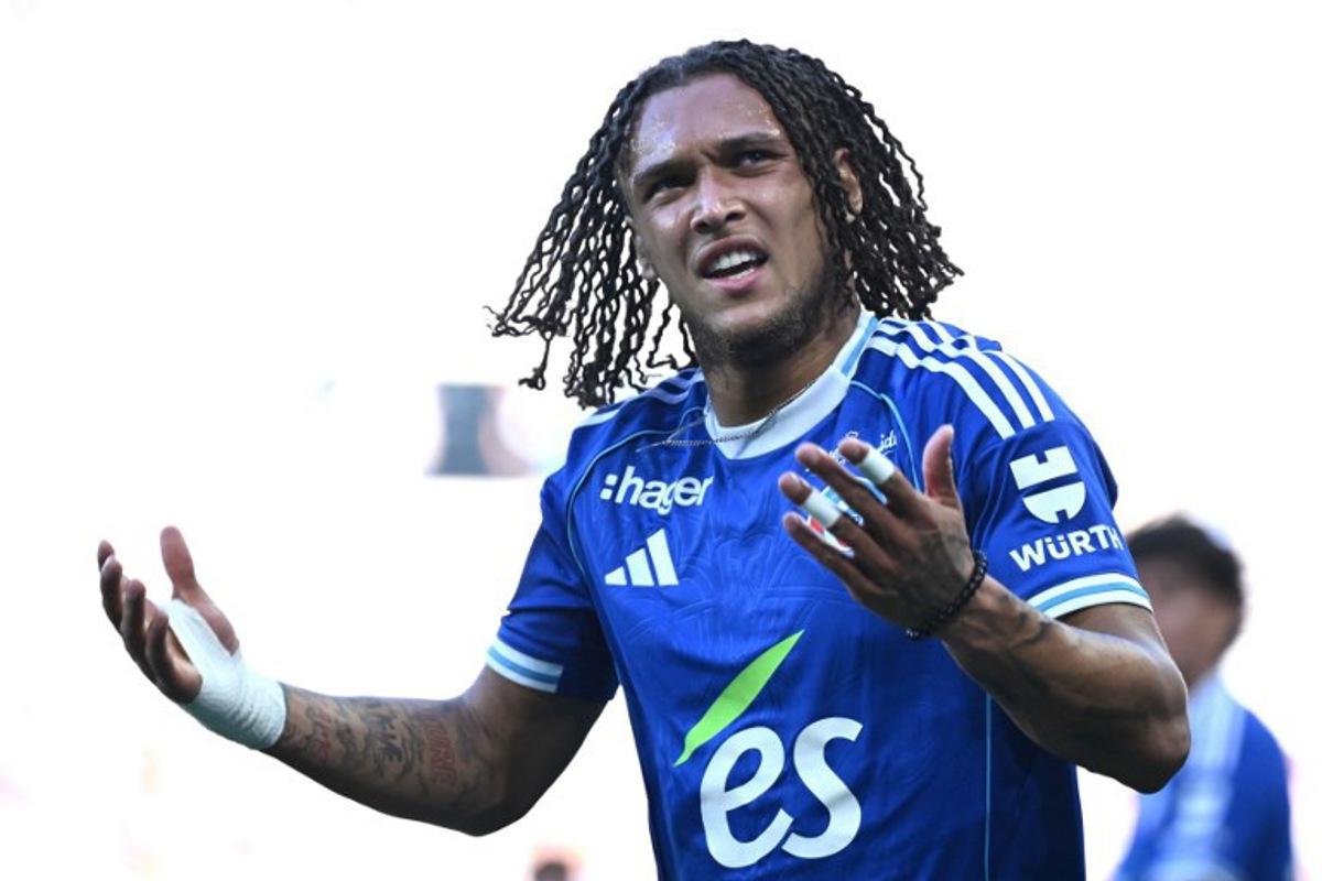 Strasbourg's Belgian midfielder #07 Diego Moreira reacts after his team's first goal during the French L1 football match between RC Strasbourg Alsace and FC Nantes at Stade de la Meinau in Strasbourg, eastern France on August 24, 2025. SEBASTIEN BOZON / AFP