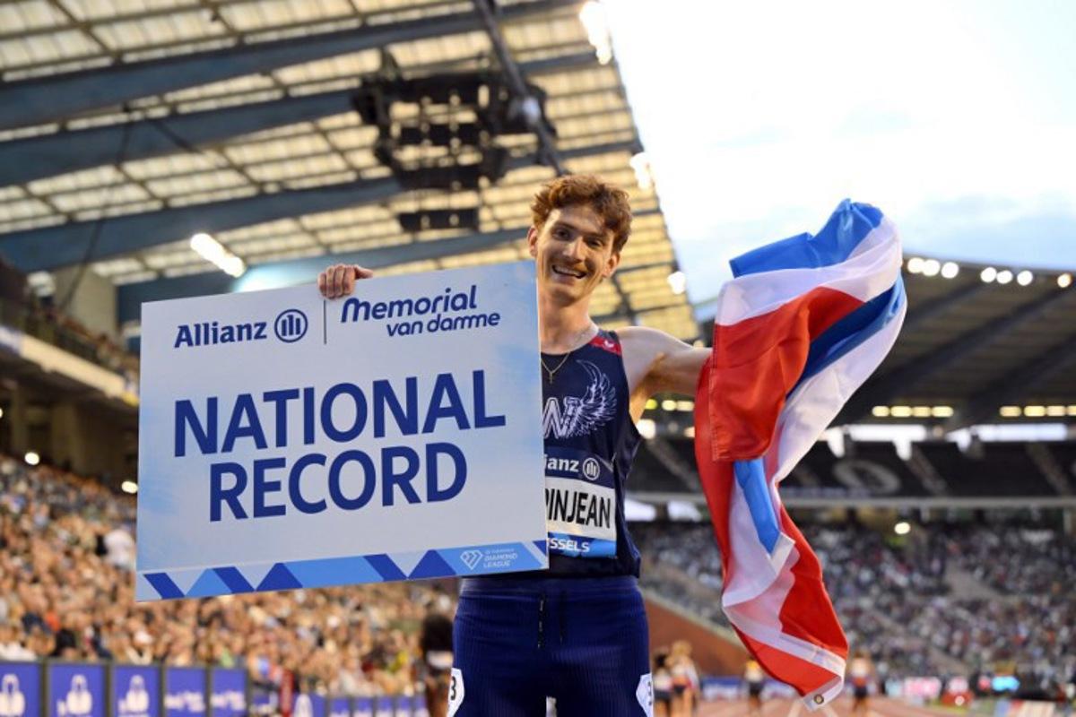 Luxembourg's Ruben Querinjean celebrates after winning and setting a new National Record in the Men's 3000m Steeplechase event of the Diamond League athletics meeting at the King Baudouin Stadium in Brussels on August 22, 2025. JOHN THYS / AFP