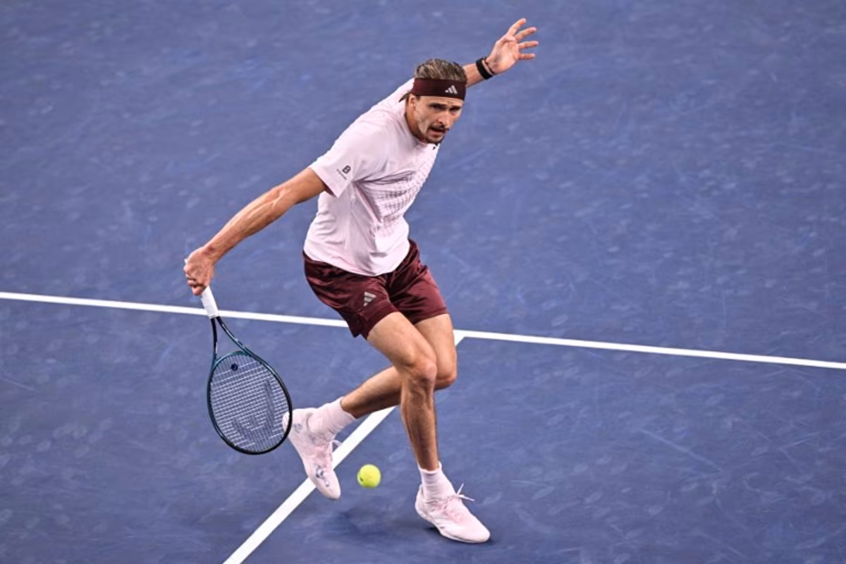 Germany's Alexander Zverev hits a return to Australia's Alex de Minaur during their men's singles quarter-final match at the Shanghai Masters tennis tournament in Shanghai on October 15, 2026. Hector RETAMAL / AFP