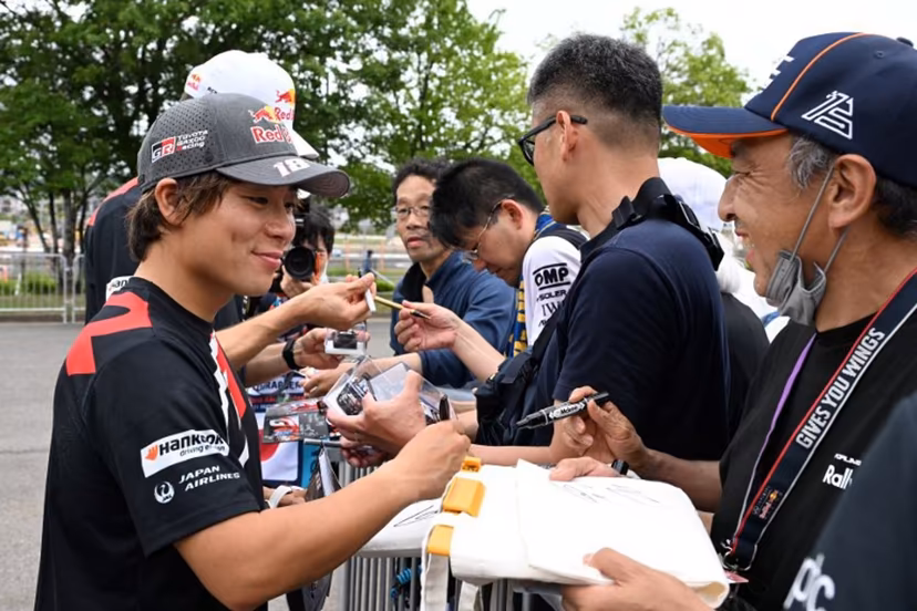 Toyota Gazoo Racing WRT team's Takamoto Katsuta of Japan meets fans during an autograph-signing session of the Rally Japan, the 7th round of the FIA World Rally Championships in Toyota city, Aichi prefecture on May 28, 2026. Toshifumi KITAMURA / AFP