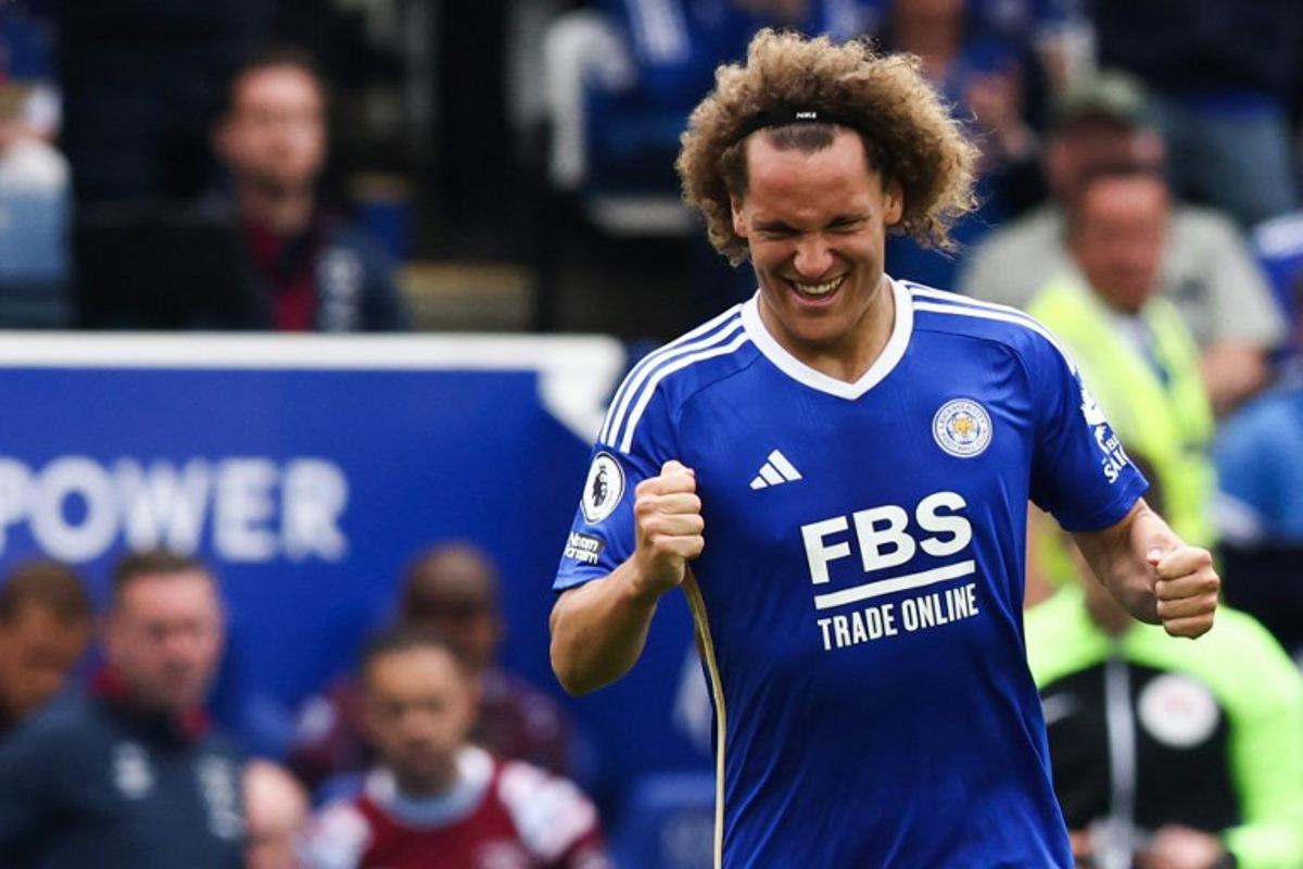 Leicester City's Belgian defender Wout Faes (R) celebrates after scoring his team second goal during the English Premier League football match between Leicester City and West Ham United at King Power Stadium in Leicester, central England on May 28, 2023. DARREN STAPLES / AFP
