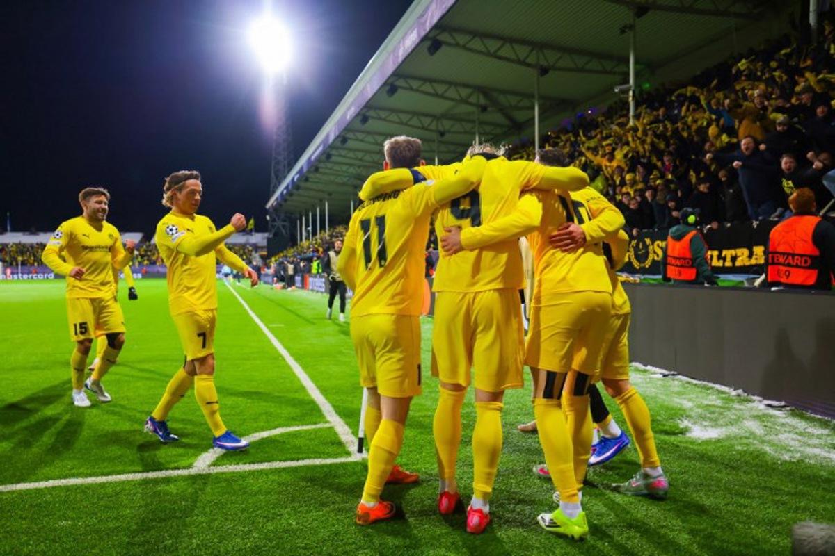 Bodo/Glimt's Norwegian forward #10 Jens Petter Hauge (R) celebrates scoring with his teammates during the UEFA Champions League first-leg, play-off football match Bodo/Glimt vs Inter Milan at Aspmyra statium in Bodo, Norway on February 18, 2026. Thomas Andersen / NTB / AFP