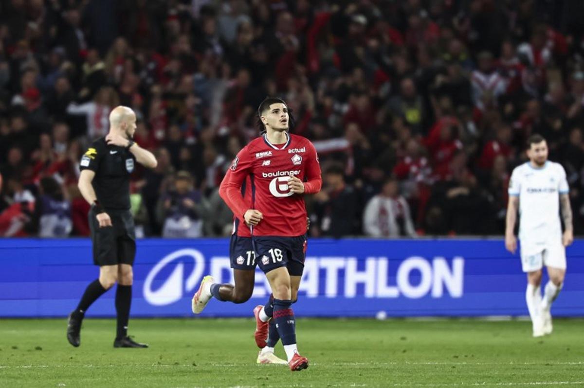 Lille's Belgian forward #19 Matias Fernandez-Pardo (C) reacts after scoring Lille's first goal during the French L1 football match between Lille (LOSC) and Olympique de Marseille (OM) at the Pierre-Mauroy stadium in Villeneuve-d'Ascq, northern France, on May 4, 2025. Sameer Al-DOUMY / AFP