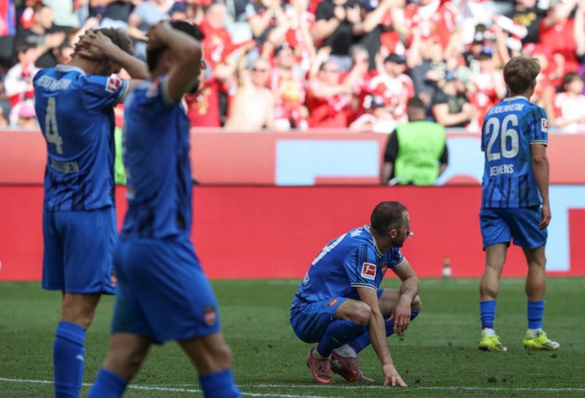 Heidenheim's German defender #19 Jonas Foehrenbach reacts after the German first division Bundesliga football match between FC Bayern Munich and Heidenheim in Munich on May 2, 2026. Alexandra BEIER / AFP