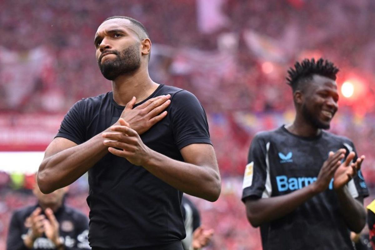 Bayer Leverkusen's German defender #04 Jonathan Tah reacts after the German first division Bundesliga football match between Mainz 05 and Bayer Leverkusen in Mainz, western Germany, on May 17, 2025. Kirill KUDRYAVTSEV / AFP