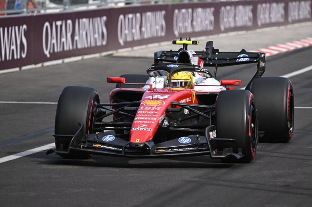 Ferrari's British driver Lewis Hamilton competes during the qualifying session at the Hungaroring racetrack in Mogyorod near Budapest, Hungary, on July 25, 2026 ahead of the Formula One Hungarian Grand Prix. Attila KISBENEDEK / POOL / AFP