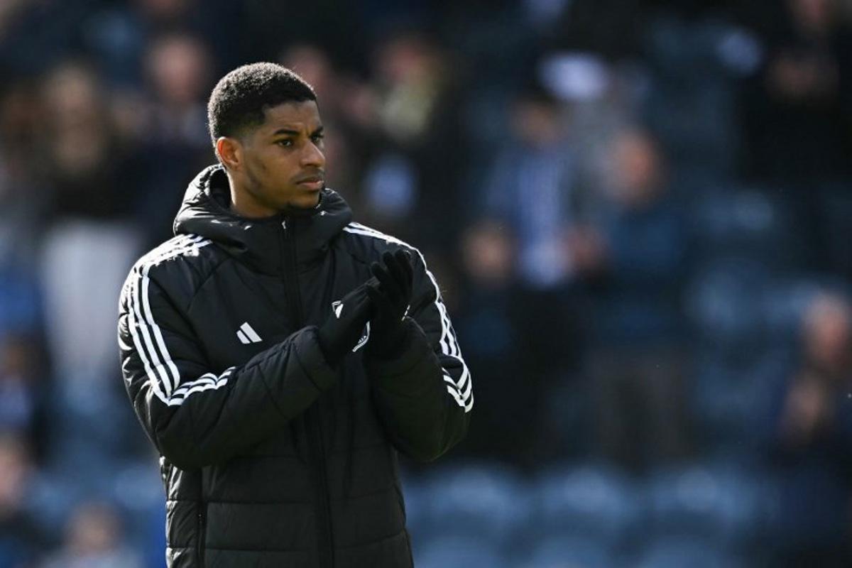 Aston Villa's English striker #09 Marcus Rashford applauds as he celebrates at the end of the English FA Cup quarter-final football match between Preston North End and Aston Villa at Deepdale stadium in Preston, north-west England on March 30, 2025. Aston Villa wins 3 - 0 against Preston North End. Paul ELLIS / AFP