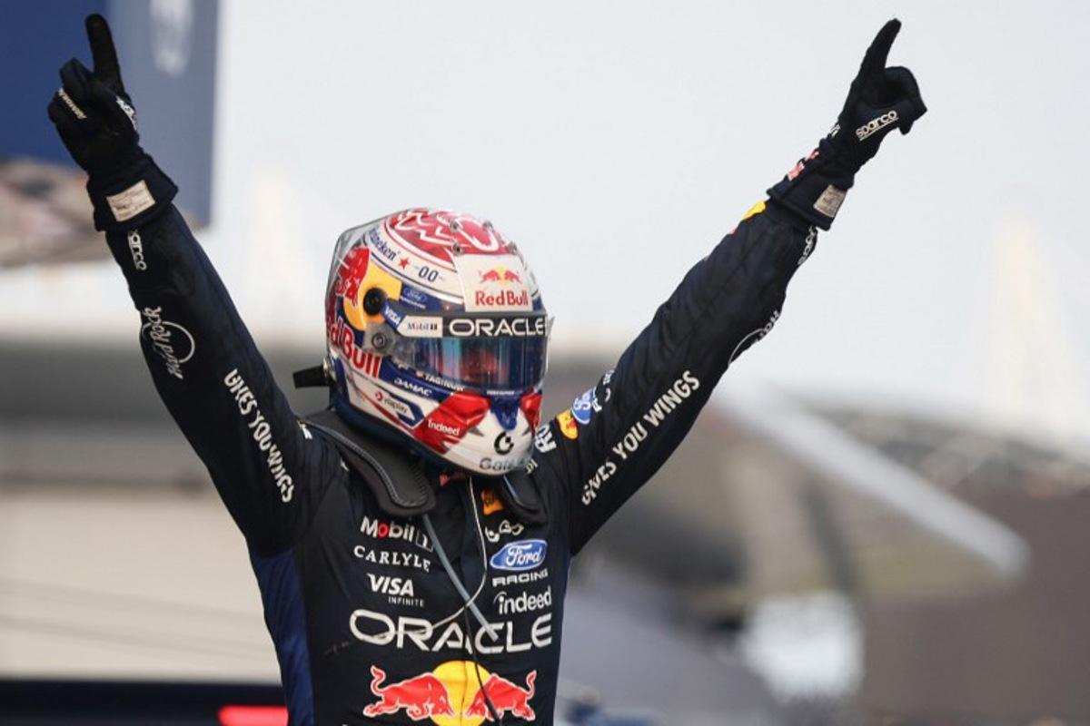 Race winner Red Bull Racing's Dutch driver Max Verstappen celebrates following the Formula One Bahrain Grand Prix in Sepang on October 4, 2026. I-HWA CHENG / AFP