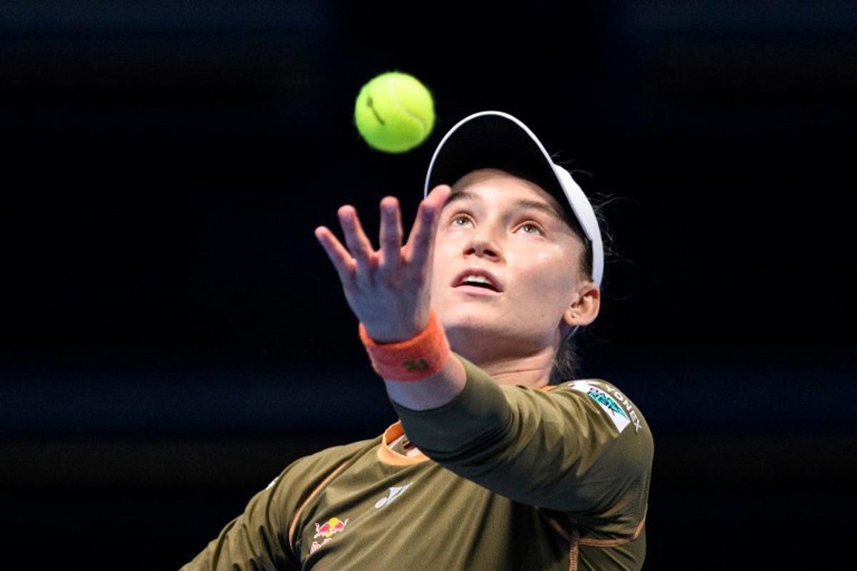 Kazakhstan's Elena Rybakina serves against Canada's Victoria Mboko during their women's singles match at the Pan Pacific Open tennis tournament in Tokyo on October 24, 2025. Philip FONG / AFP