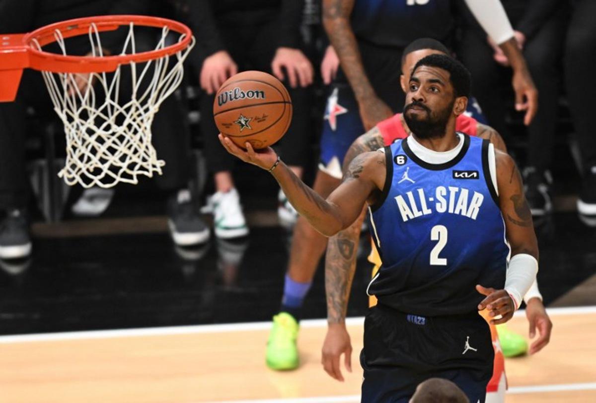 Dallas Mavericks' pro-basketball player Kyrie Irving goes for the shot during the NBA All-Star game between Team Giannis and Team LeBron at the Vivint arena in Salt Lake City, Utah, February 19, 2023. Patrick T. Fallon / AFP