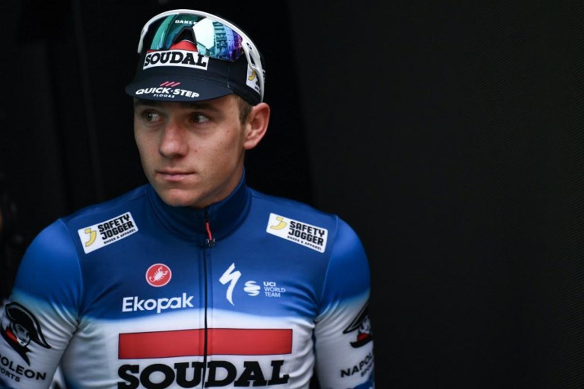 Soudal Quick-Step team's Belgian rider Remco Evenepoel looks on at the podium area after placing second in the 118th edition of the Giro di Lombardia (Tour of Lombardy), a 252km cycling race from Bergamo to Como on October 12, 2024. Marco BERTORELLO / AFP
