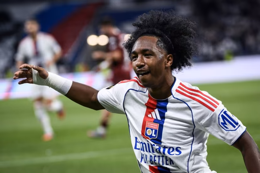Lyon's Belgian forward #11 Malick Fofana (C) celebrates after scoring a goal during the French L1 football match between Olympique Lyonnais (OL) and FC Metz at the Groupama Stadium in Decines-Charpieu, central-eastern France on August 23, 2025. ARNAUD FINISTRE / AFP