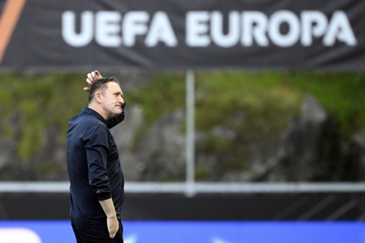 Ferencvaros' Irish coach Robbie Keane reacts at the end of the UEFA Europa League last 16 second leg football match between SC Braga and Ferencvaros at Municipal stadium of Braga on March 18, 2026. Miguel RIOPA / AFP