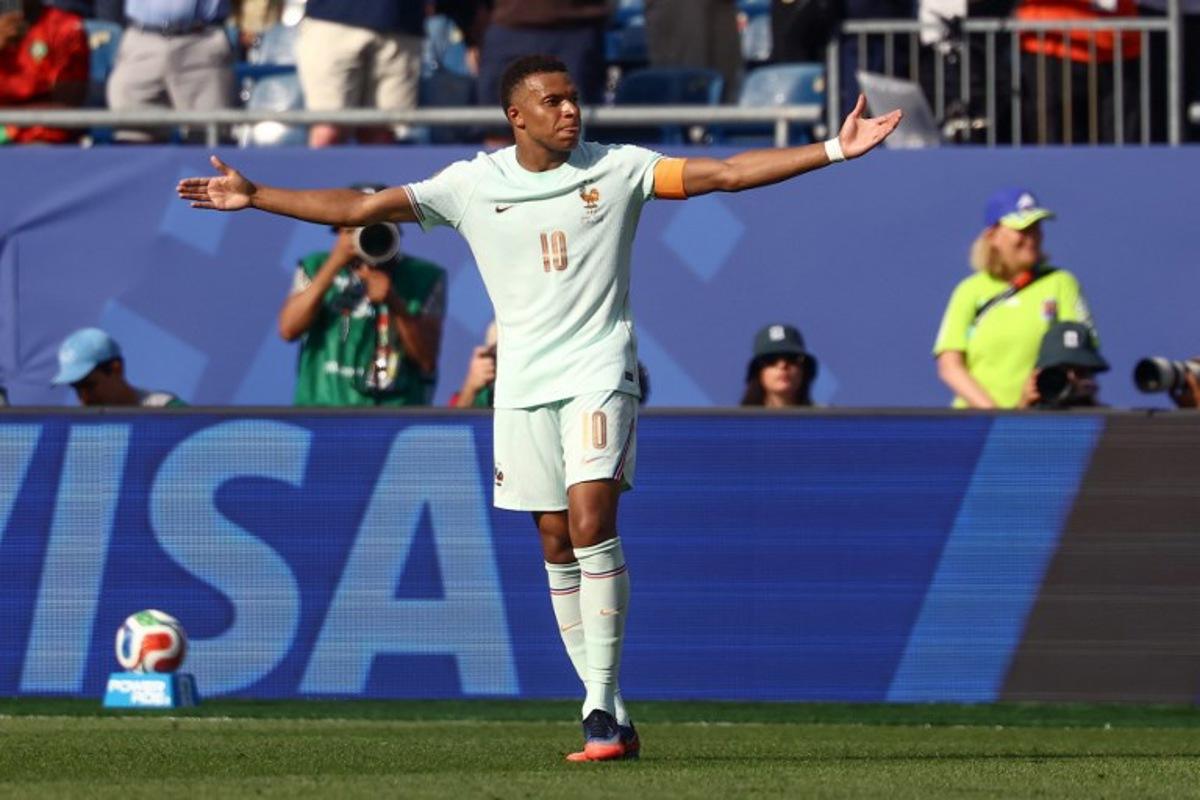 France's forward #10 Kylian Mbappe celebrates scoring his team's first goal during the 2026 World Cup football tournament quarter-final match between France and Morocco at Boston Stadium in Foxborough on July 9, 2026. CHARLY TRIBALLEAU / AFP