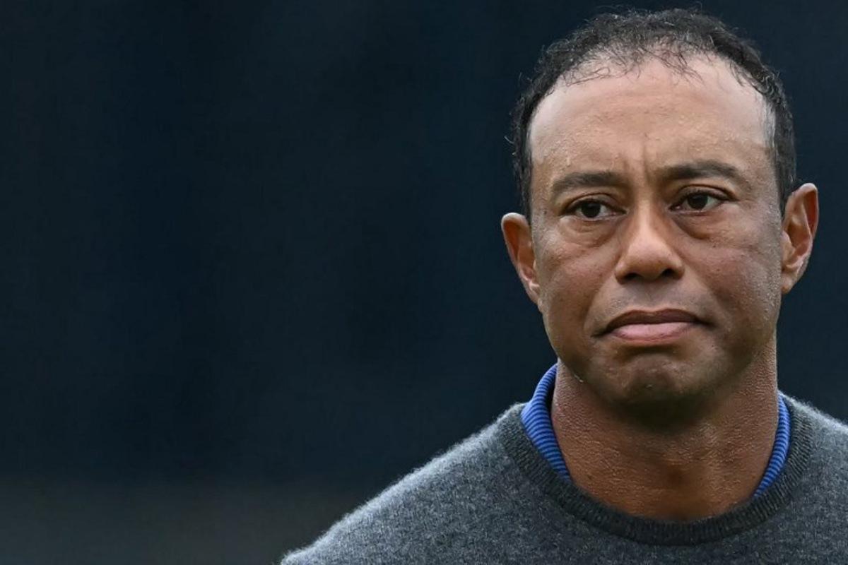 (FILES) US golfer Tiger Woods reacts on the 18th green after his first round 79 on the opening day of the 152nd British Open Golf Championship at Royal Troon on the south west coast of Scotland on July 18, 2024. Golf superstar Tiger Woods was involved in a car crash in Florida on March 27, 2026, US media reports citing local law enforcement said. There was no immediate word on Woods' condition following the incident in Jupiter Island, ABC television reported. Paul ELLIS / AFP