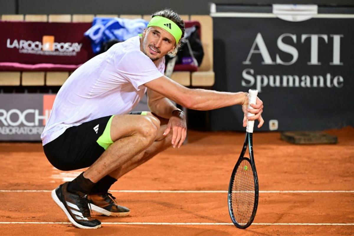 Germany's Alexander Zverev reacts during the men's singles quarter-final match against Italy's Lorenzo Musetti at the ATP Rome Open tennis tournament at Foro Italico in Rome on May 14, 2025. PIERO CRUCIATTI / AFP