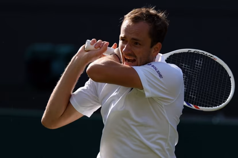 Russia's Daniil Medvedev returns to Croatia's Marin Cilic during their men's singles first round tennis match on the first day of the 2026 Wimbledon Championships at The All England Lawn Tennis and Croquet Club in Wimbledon, southwest London, on June 29, 2026. Adrian Dennis / AFP