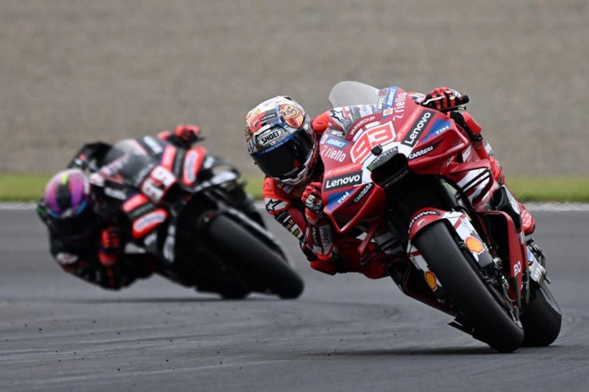 Ducati Lenovo Team rider Marc Marquez of Spain leads Aprilia Racing rider Jorge Martin of Spain during the MotoGP Japanese Grand Prix at the Mobility Resort Motegi in Motegi, Tochigi prefecture on October 4, 2026. Toshifumi KITAMURA / AFP