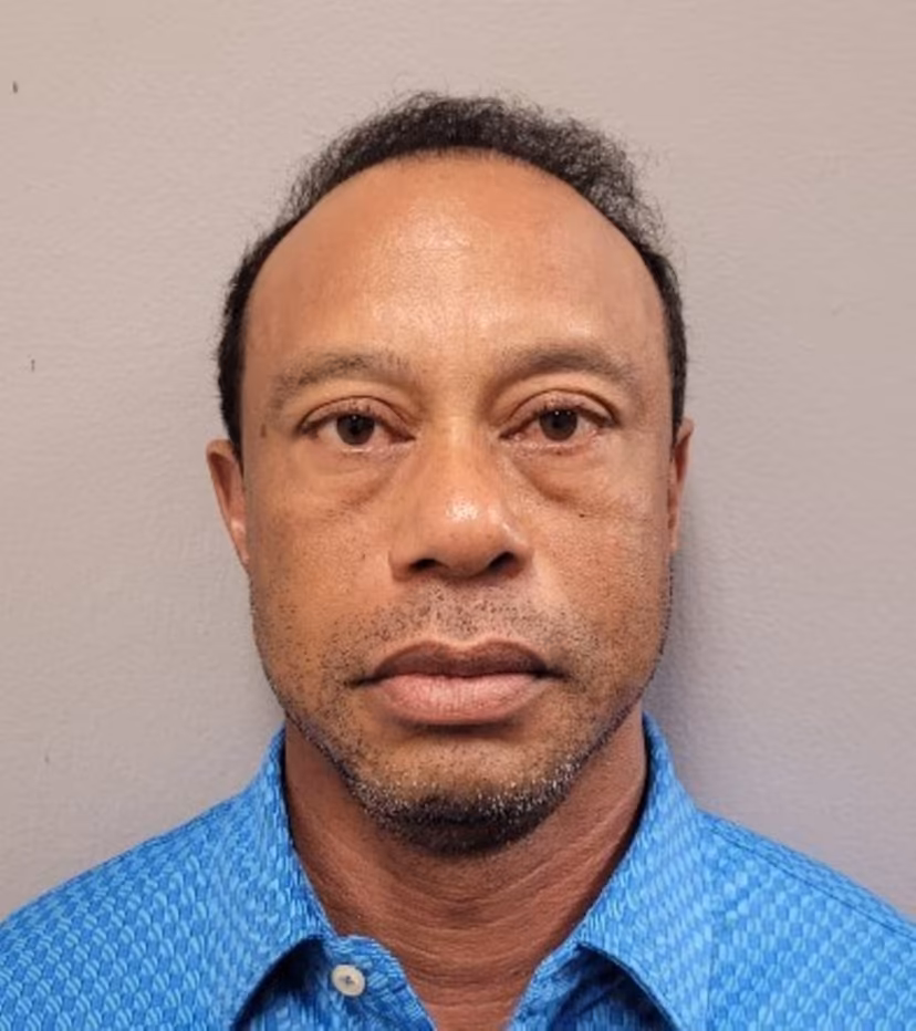 This handout mugshot released on March 27, 2026 provided by the Martin County Sheriff's Office shows the mugshot of US golfer Tiger Woods, 50, who was arrested in Jupiter Island, Florida on March 27, 2026. The golf icon was arrested and charged with driving under the influence after a rollover crash near his Florida home, authorities said. HANDOUT / Florida Department of Corrections / AFP
