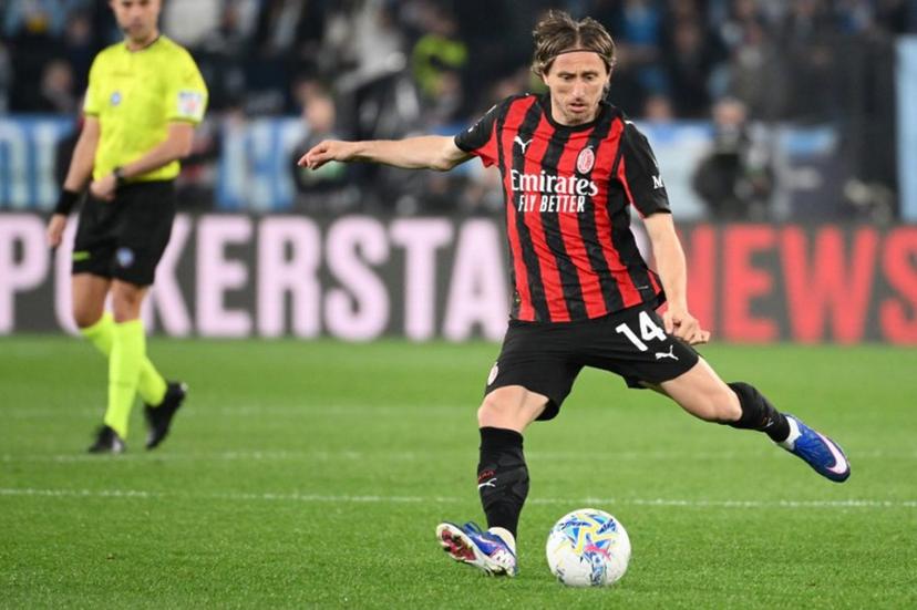 AC Milan's Croatian midfielder #14 Luka Modric kicks the ball during the Italian Serie A football match between Lazio and AC Milan at the Olympic Stadium in Rome on March 15, 2026. Alberto PIZZOLI / AFP