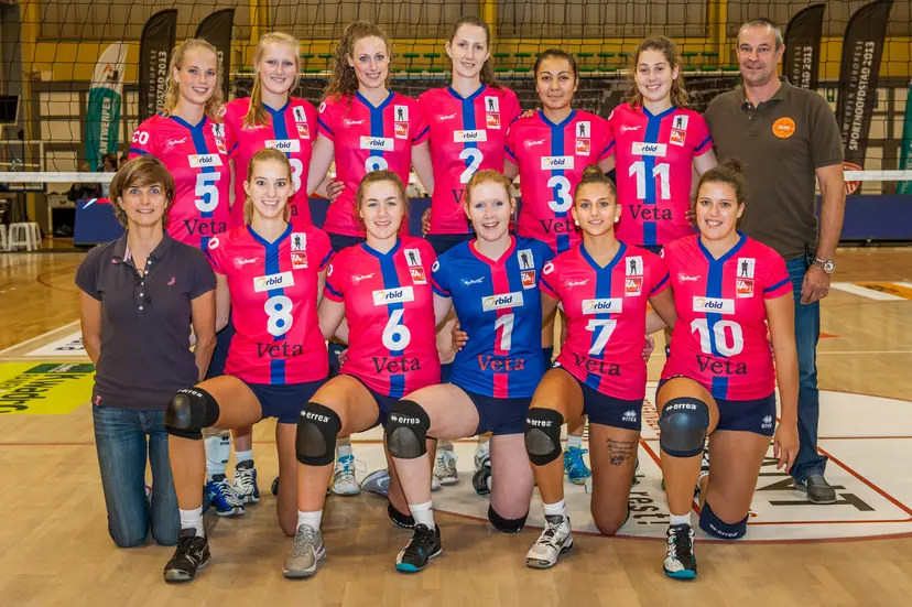 20131005 - DEURNE, BELGIUM: (Back row) 05 Oudegem's Fien Callens, Oudegem's Bente Daniels, Oudegem's Lore Gillis, Oudegem's Wioletta Szkudlarek, Oudegem's Leyla Tuifua, Oudegem's Valerie Courtois, Oudegem's head coach Alexandre Koulberg, (front row) Oudegem's assistant coach Anja Duyck, Oudegem's Elien Ruysschaert, Oudegem's Jutta Van de Vyver, Oudegem's Lisa Neyt, Oudegem's Lorena Cianci and Oudegem's Mira Juwet pose for a team photo before the women's volleyball Supercup match between Gent and Oudegem, in Deurne, Saturday 05 October 2013. BELGA PHOTO JONAS ROOSENS