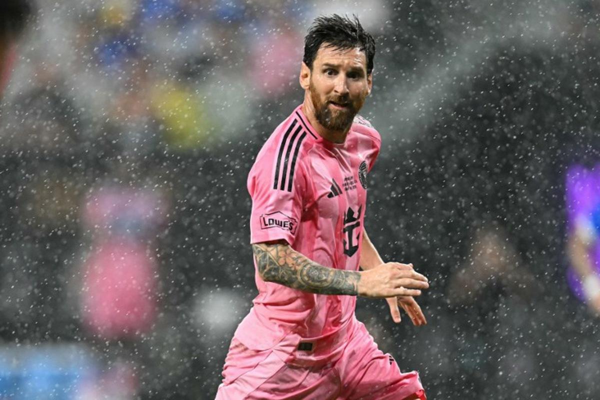 Inter Miami's Argentine forward #10 Lionel Messi runs under a light rain during the Campeones Cup final football match between Inter Miami CF and Mexico's Cruz Azul at Nu Stadium in Miami, Florida, on September 16, 2026. CHANDAN KHANNA / AFP