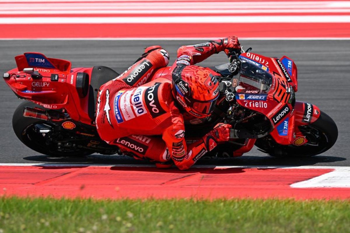 Ducati Lenovo Team's Spanish MotoGP rider Marc Marquez rides during the warm-up ahead of the MotoGP Indonesian Grand Prix at the Mandalika International Circuit in Mandalika, West Nusa Tenggara on October 5, 2025. SONNY TUMBELAKA / AFP