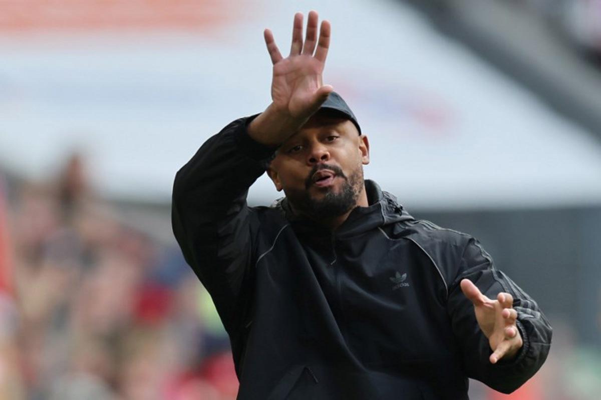Bayern Munich's Belgian head coach Vincent Kompany (C) gestures during the German first division Bundesliga football match between FC Bayern Munich and FC Cologne in Munich, southern Germany, on May 16, 2026. Alexandra BEIER / AFP