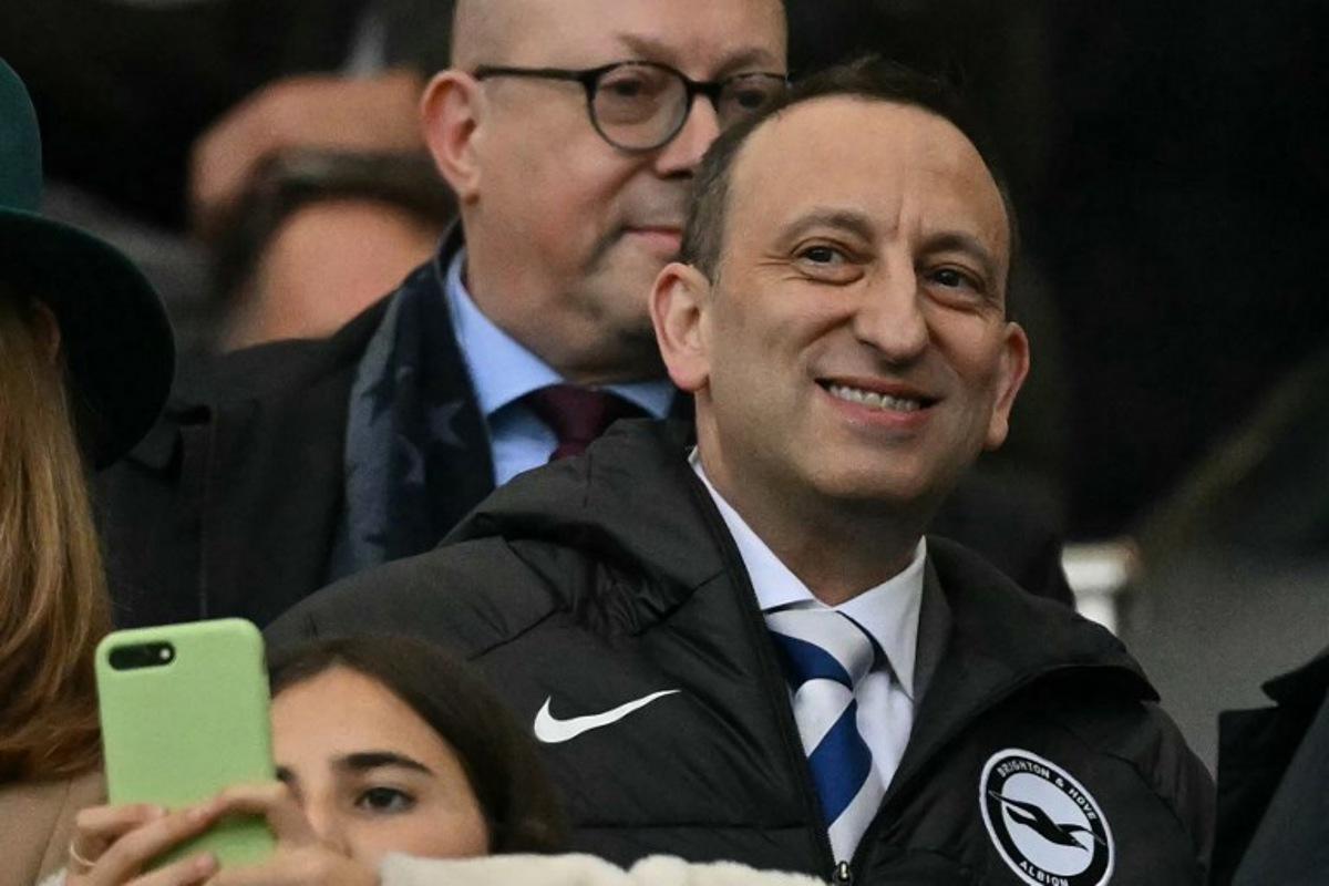 Brighton's chairman Tony Bloom takes his seat for the English Premier League football match between Brighton and Hove Albion and Tottenham Hotspur at the American Express Community Stadium in Brighton, southern England on October 6, 2024. Glyn KIRK / AFP