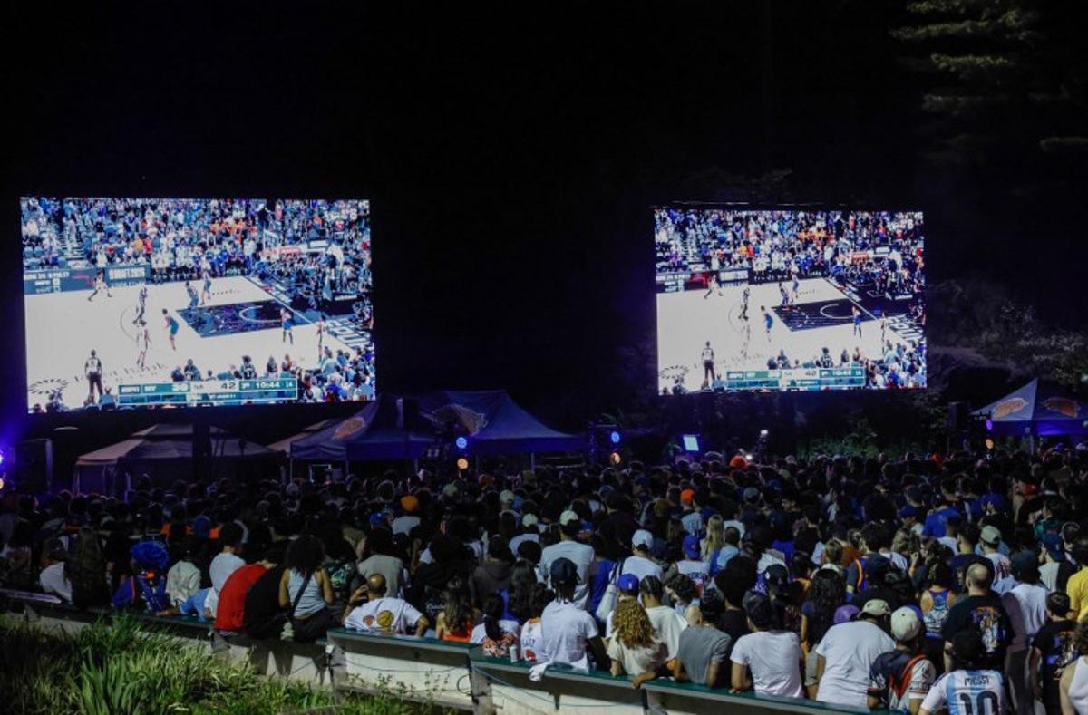 Knicks fans gather inside Wollman Rink in Central Park to watch Game 5 of the NBA finals between the New York Knicks and San Antonio Spurs, in New York, on June 13, 2026. kena betancur / AFP