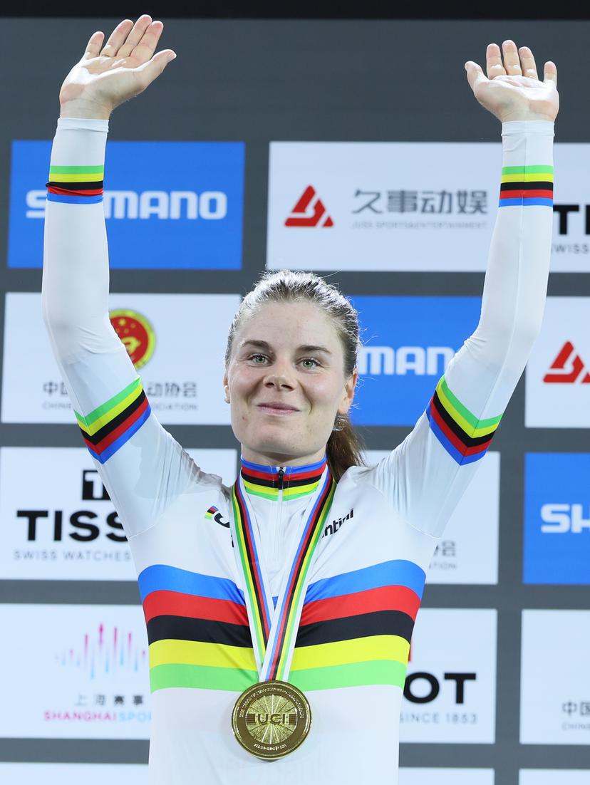 Belgian Lotte Kopecky celebrates on the podium after winning the Women's Elimination event at the UCI Track Cycling World Championships in Shanghai, China on Thursday 15 October 2026. The worlds are taking place from 14 to 18 October 2026. BELGA PHOTO BENOIT DOPPAGNE