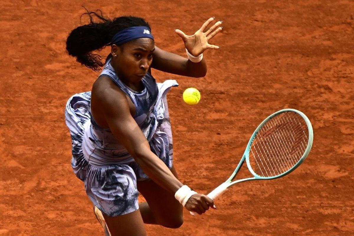 US Coco Gauff plays a backhand return to Belarus' Aryna Sabalenka during their women's singles final match on day 14 of the French Open tennis tournament on Court Philippe-Chatrier at the Roland-Garros Complex in Paris on June 7, 2025. JULIEN DE ROSA / AFP
