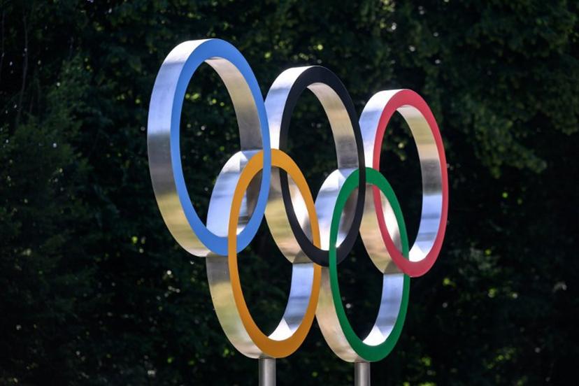 This photograph shows the Olympic rings prior to an IOC executive commission meeting ahead of IOC session, at the Olympic House in Lausanne, on June 22, 2026. Fabrice COFFRINI / AFP