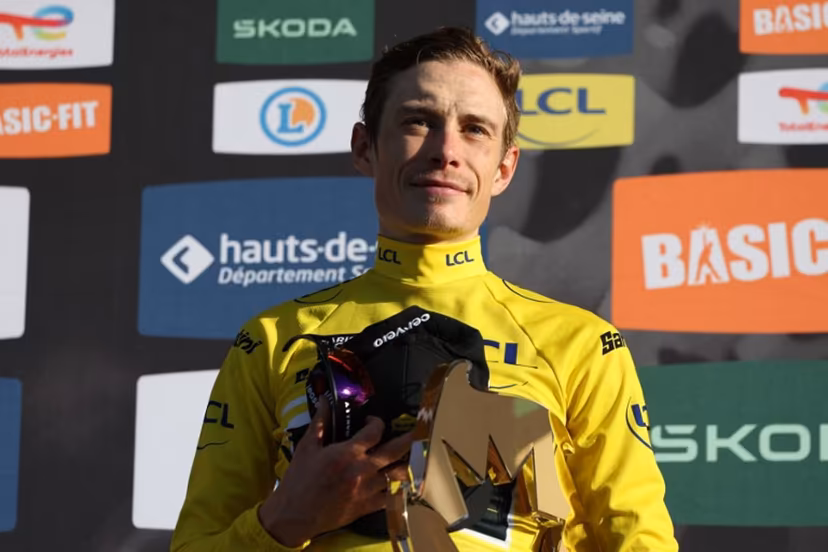 Team Visma - Lease a Bike's Danish rider Jonas Vingegaard celebrates with the trophy after winning the 2026 Paris-Nice cycling race, on March 15, 2026. Anne-Christine POUJOULAT / AFP