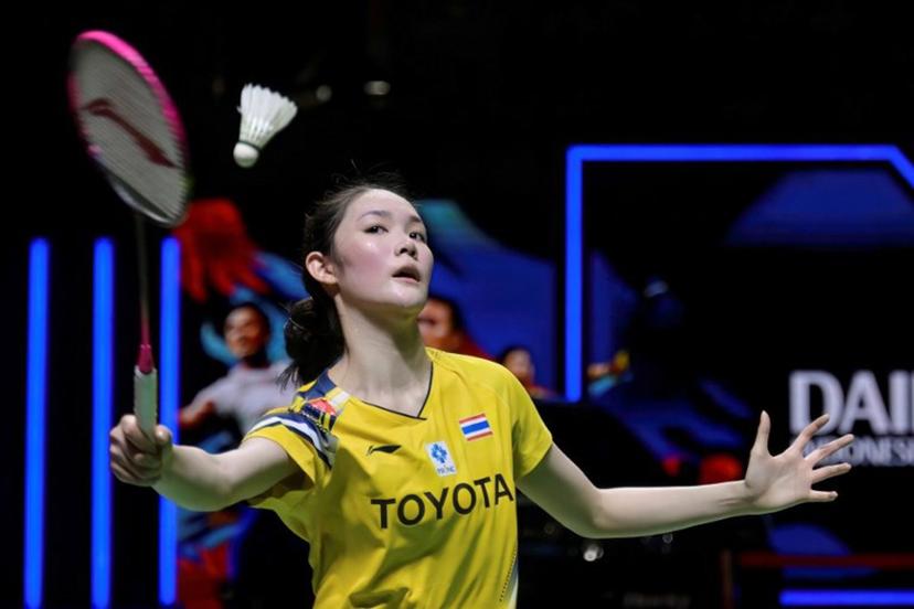 Thailand's Pitchamon Opatniputh hits a return during her women's singles final match against China's Chen Yufei at the Indonesia Masters badminton tournament in Jakarta on January 25, 2026. BAY ISMOYO / AFP