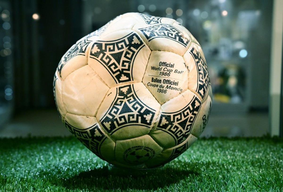 The ball that was used in the 1986 World Cup match between Argentina and England during which Argentina's Diego Maradona scored the "Hand of God" goal is displayed before auction at Heritage Auctions in Beverly Hills, California, on August 7, 2026. The ball that Maradona used to score his infamous "Hand of God" goal is expected to sell for $10 million at a US auction this month. Maradona's goal in the quarter-final match at the Estadio Azteca saw him punch the ball past the England goalkeeper, with the South Americans ultimately winning 2-1. Frederic J. BROWN / AFP