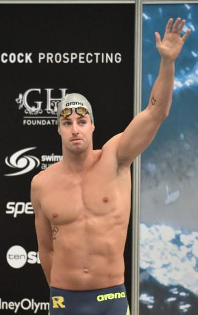 James Magnussen waves before competing in the 100m freestyle final at Australia's world championship trials in Sydney on April 7, 2015. AFP PHOTO / Peter PARKS IMAGE STRICTLY FOR EDITORIAL USE - STRICTLY NO COMMERCIAL USE IMAGE STRICTLY FOR EDITORIAL USE - STRICTLY NO COMMERCIAL USE